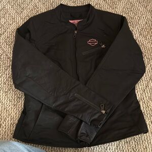 Black Harley Davison riding coat with pink and pink jewls